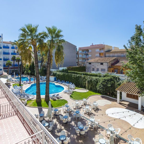 View from a balcony to the swimming pool of Solimar Hotel Apartments